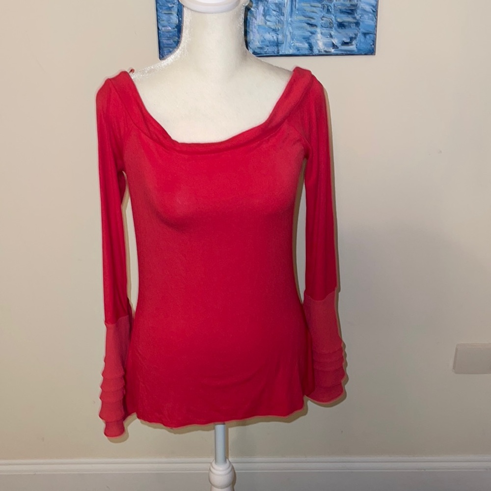 Coral colored scoop neck long sleeve shirt with sheer layered bell sleeves. EUC